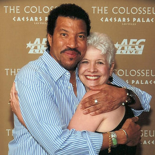 Lionel Richie hugs Marsala.